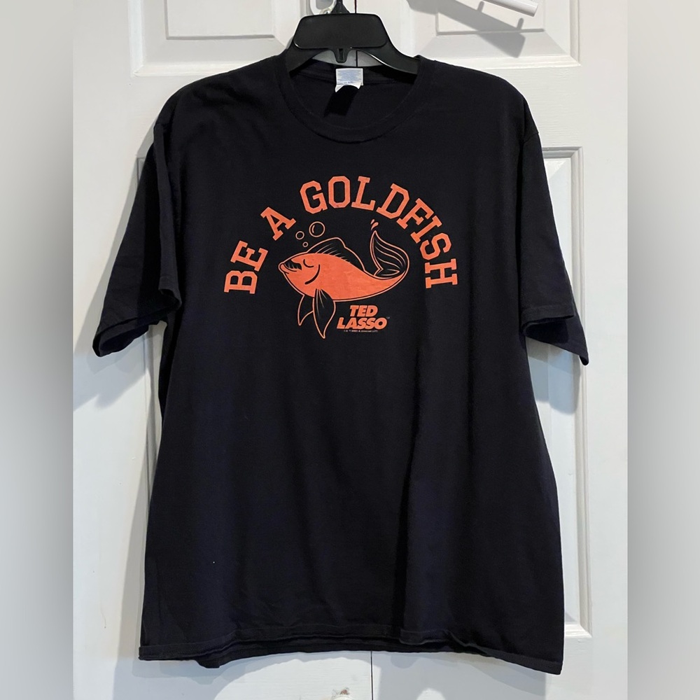 “BE A GOLDFISH” / Ted Lasso , Black Short Sleeve T with Orange Goldfish Design - Picture 2 of 5